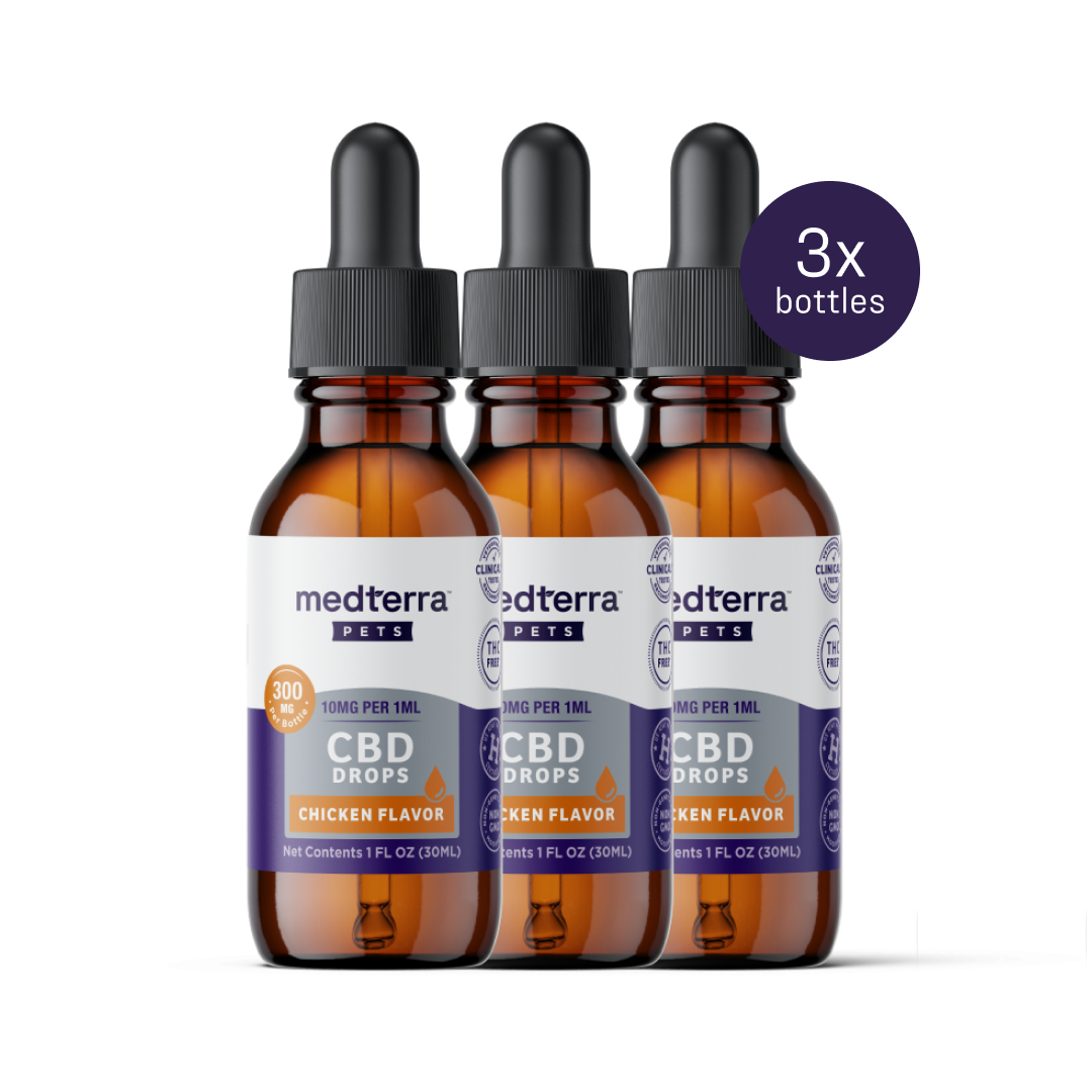 Three Medterra Pet CBD Drops bottles, chicken flavor, are displayed. Each amber bottle with a dropper features a label indicating 300mg CBD for joint health and wellness, dosing at 10mg per 1ml. A "3x bottles" badge is in the upper right.