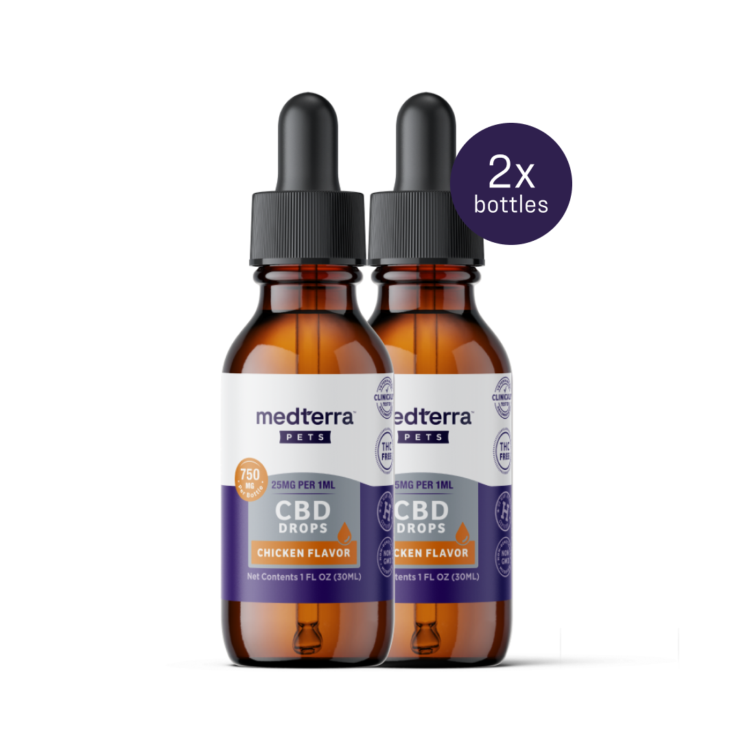 Two brown bottles of Medterra Pet CBD Drops (750 mg each, chicken-flavored, 1 oz) support joint health and general pet wellness. The label is white with purple-orange accents, and a "2x bottles" badge is on the top right.