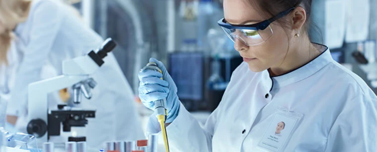 Scientist in a laboratory using a pipette to analyze CBD spectrums and cannabinoids