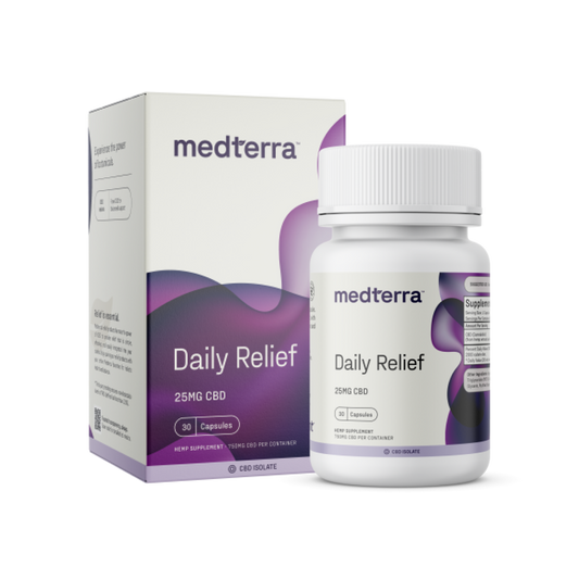 A bottle and box of Medterra's Daily Relief CBD Isolate Capsules. The white and purple packaging indicates that each capsule contains 25mg of CBD isolate, with a total of 30 capsules per bottle. These high-quality capsules are formulated with organic MCT coconut oil for enhanced absorption.