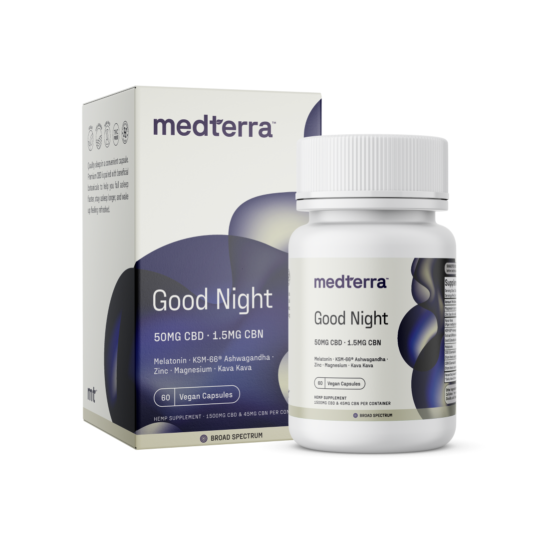 A white bottle labeled "Medterra Good Night Capsules" stands next to its matching box. The label indicates it contains 50mg CBD, 1.5mg CBN, melatonin and magnesium, ashwagandha, zinc, and kava kava. This natural sleep solution claims to have 60 vegan capsules and is broad spectrum.