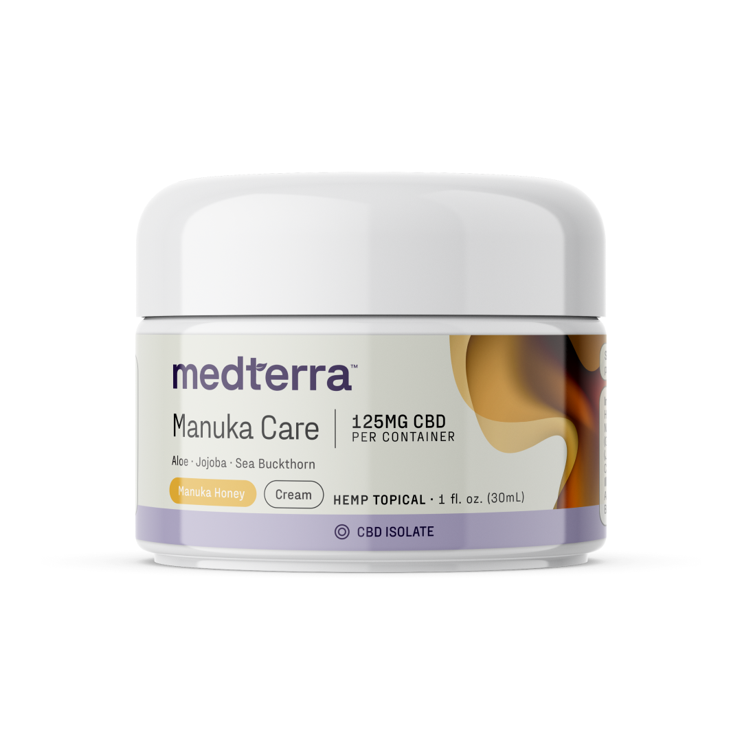 A 1 fl. oz. (30mL) jar of Medterra Manuka Care Cream, containing 125mg of CBD isolate per container. This luxurious hemp topical is formulated with aloe, jojoba, sea buckthorn, and manuka honey for ultimate skincare benefits.