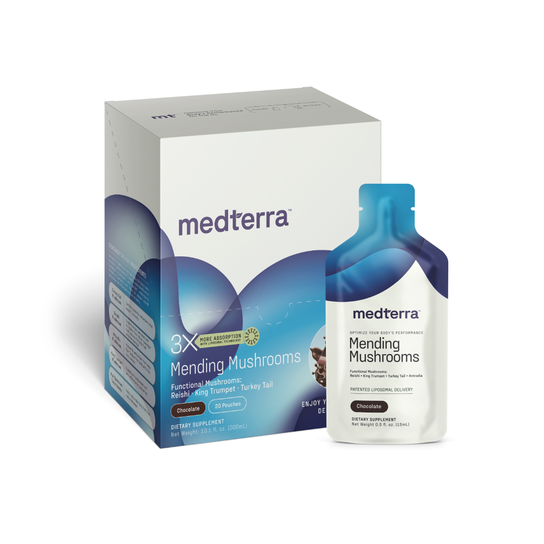 A box and a sachet of Medterra's Mending Mushrooms dietary supplement. The box highlights functional mushrooms such as Reishi, King Trumpet, and Turkey Tail for their antioxidant benefits and athletic recovery properties. It showcases a blue and white color scheme, with the sachet bearing similar branding.