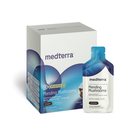 A box and a sachet of Medterra's Mending Mushrooms dietary supplement. The box highlights functional mushrooms such as Reishi, King Trumpet, and Turkey Tail for their antioxidant benefits and athletic recovery properties. It showcases a blue and white color scheme, with the sachet bearing similar branding.