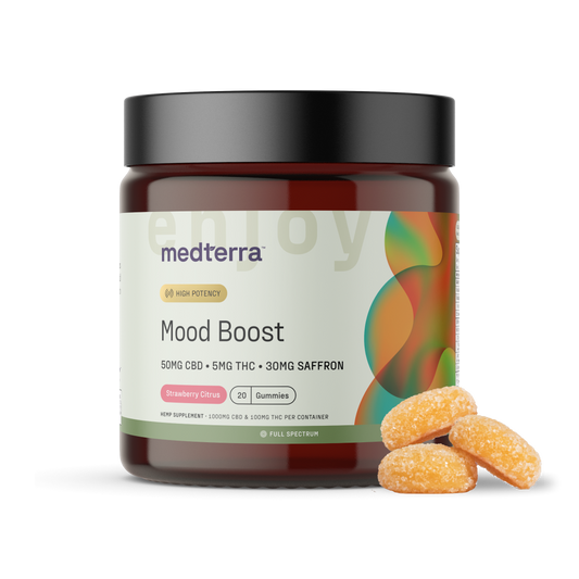 A brown jar with a black lid labeled "Medterra Mood Boost CBD Gummies" contains 20 strawberry citrus gummies, each containing 50mg of CBD, 5mg of THC, and 30mg of saffron. Three gummies are displayed outside the jar.