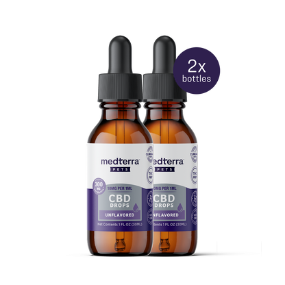 Two bottles of Medterra Pet CBD Drops, unflavored with droppers, each labeled 300mg and 10mg per 1ml in a 1 fl. oz. bottle. A note says "2x bottles," ideal for supporting your pet's joint health.