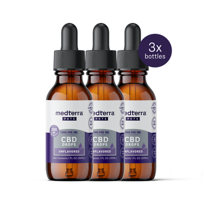 Three brown glass bottles with droppers labeled "Medterra Pet CBD Drops" are neatly arranged in a row. The white and purple label highlights their unflavored nature, with a purple circle reading "3x bottles." These drops feature CBD Isolate for supporting your pet's joint health.