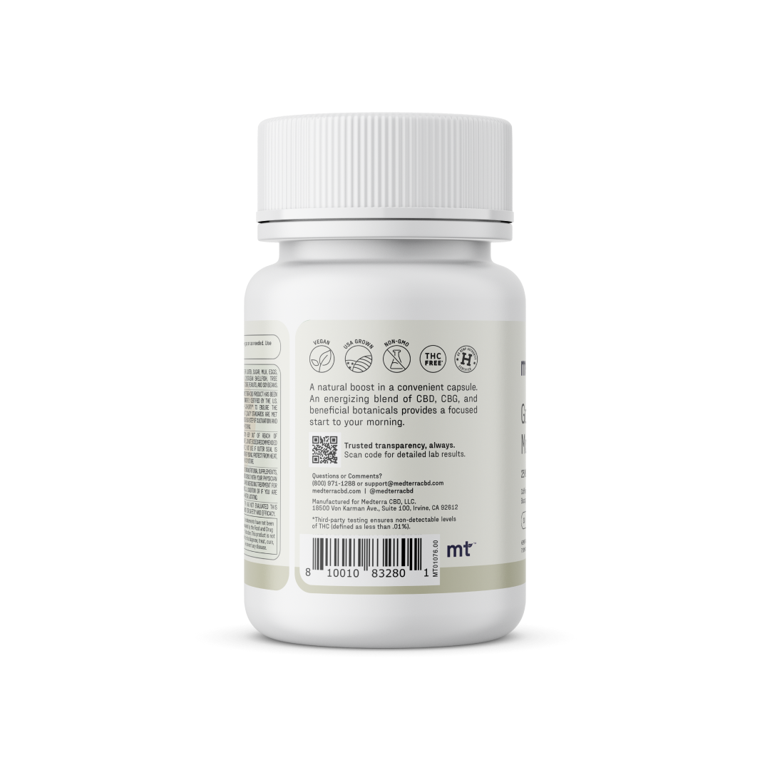 A white bottle of Medterra Good Night Capsules features a label with text and symbols, including a barcode at the bottom. The label describes ingredients like melatonin and magnesium, along with a blend of CBD, CBG, and botanicals. The bottle is topped with a ridged white cap.