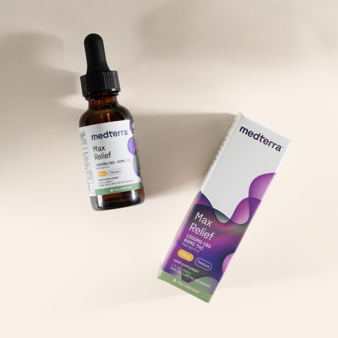 A labeled brown dropper bottle lies on its side beside an upright white and purple box, both branded with "Medterra." The product, named "Max Relief Full Spectrum CBD Oil," contains True Full Spectrum CBD derived from organically grown hemp. The box showcases "1500mg CBD+THC," "Relax," and "Full Spectrum.