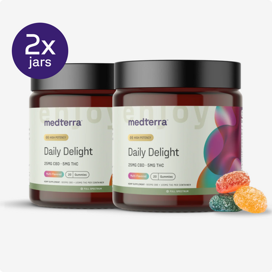 Two jars of Medterra’s Daily Delight Bundle are displayed side by side, with vibrant CBD and THC gummies in front. A purple circle at the top left reads "2x jars." Each gummy delivers 25mg CBD and 5mg THC.