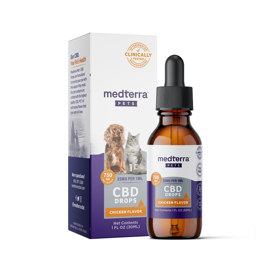 An amber glass bottle of Medterra Pet CBD Drops, featuring natural beef and chicken flavorings with 750mg of CBD and a dropper, is displayed in front of its box. The packaging showcases images of a dog and cat, includes dosage information, and displays a "Clinically Tested" badge.