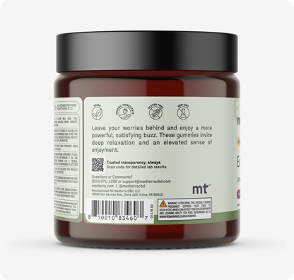 A dark amber jar with a black lid features a label for Medterra’s Extra Delight 10mg THC Gummies, high-potency edibles crafted for deep relaxation and elevated enjoyment. The label also displays contact details and a barcode.